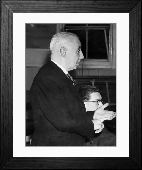 Framed Print : Villa coach Jimmy Hogan gives a talk on tactics to members of Aston Park Rangers