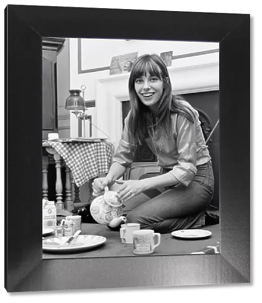English actress and singer Jane Birkin pictured at home pouring tea. March 1971