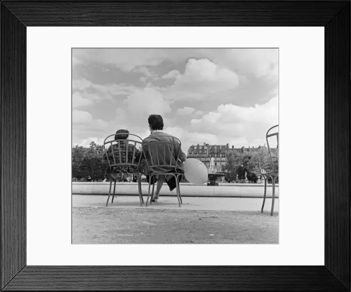 Framed Print : France Paris -A Mother and Daughter sit in a park by a fountain during the state of Framed Print : France Paris -A Mother and Daughter sit in a park by a fountain during the state of