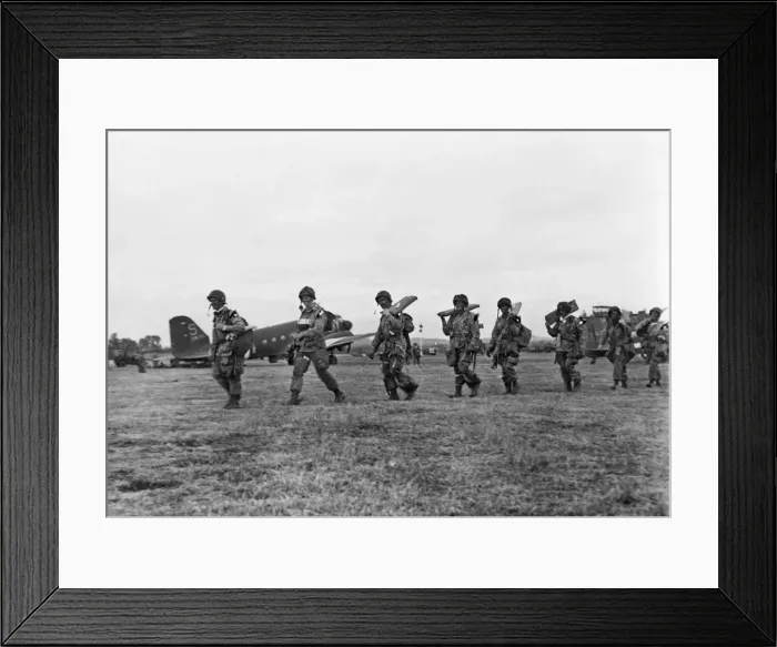 Framed Print : American paratroopers file along with full equipment to board their transport plane for Framed Print : American paratroopers file along with full equipment to board their transport plane for