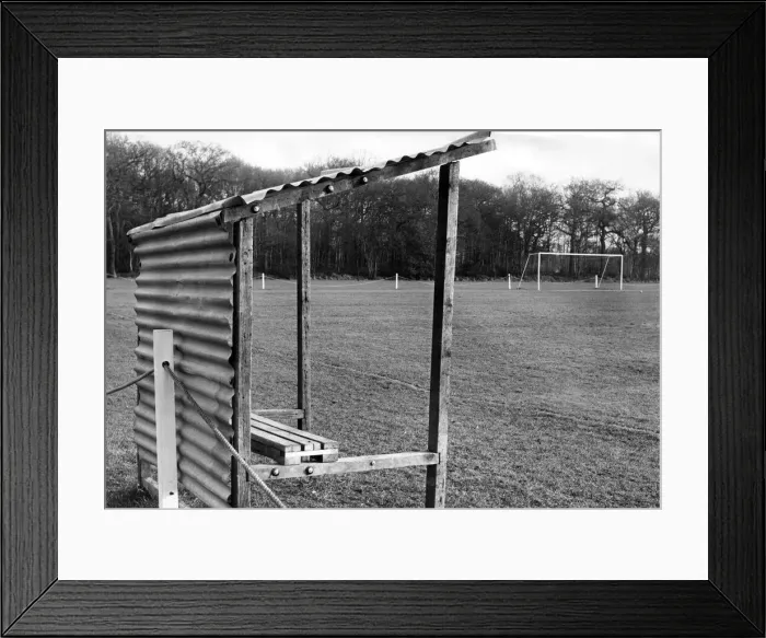 Framed Print : The only covered accommodation at Highgate United F. Cs ground - the trainers bench