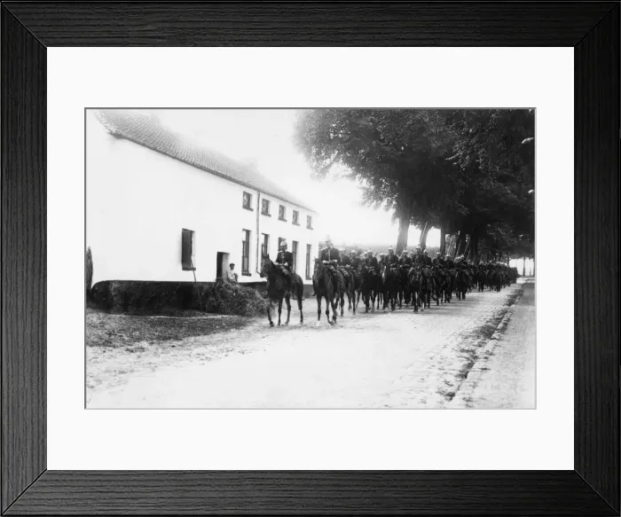 Framed Print : The Cuirassiers of the French cavalry seen here passing through a Belgium village during Framed Print : The Cuirassiers of the French cavalry seen here passing through a Belgium village during