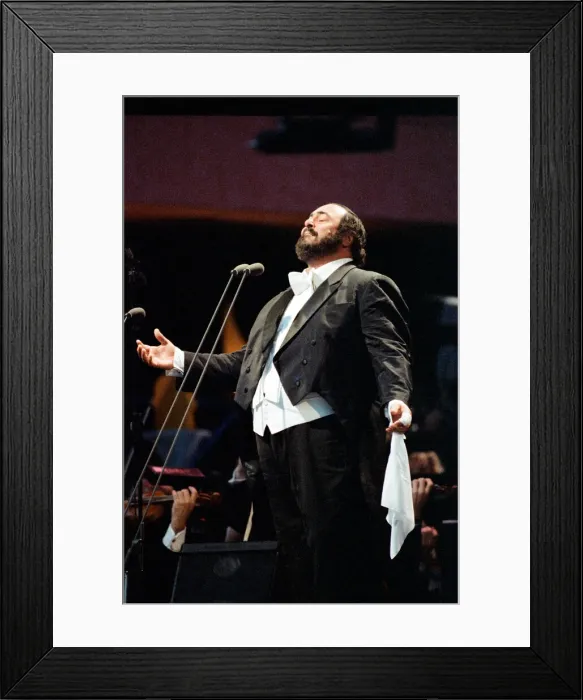 Framed Print : Luciano Pavarotti, the Italian operatic tenor, singing at an outdoor concert in