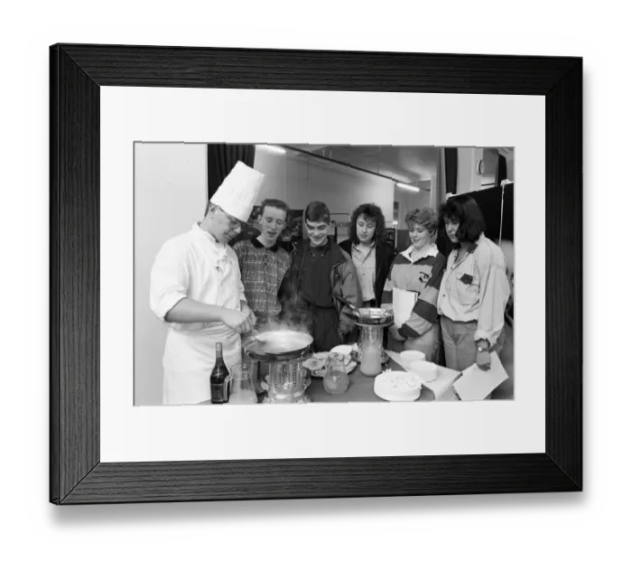 Framed Print : Second year student Simon Taylor makes flamb? pancakes in brandy for school pupils Framed Print : Second year student Simon Taylor makes flamb? pancakes in brandy for school pupils