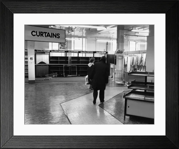 Framed Print : Some of the last customers wander through the empty sales floor as Blackers Department Framed Print : Some of the last customers wander through the empty sales floor as Blackers Department