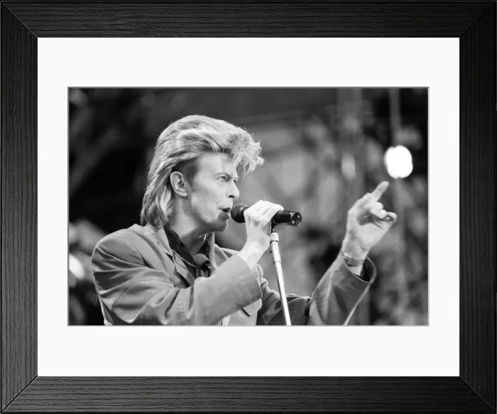 Framed Print : British pop singer David Bowie performing on stage at Wembley. 20th June 1987 Framed Print : British pop singer David Bowie performing on stage at Wembley. 20th June 1987