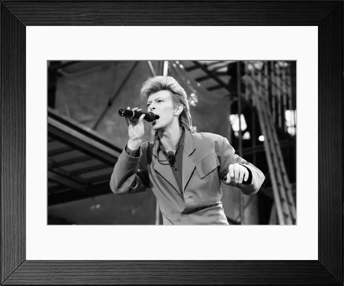 Framed Print : British pop singer David Bowie performing on stage at Wembley. 20th June 1987 Framed Print : British pop singer David Bowie performing on stage at Wembley. 20th June 1987