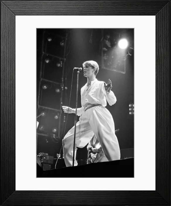 Framed Print : British pop singer David Bowie performing on stage during his concert at Earls court Framed Print : British pop singer David Bowie performing on stage during his concert at Earls court