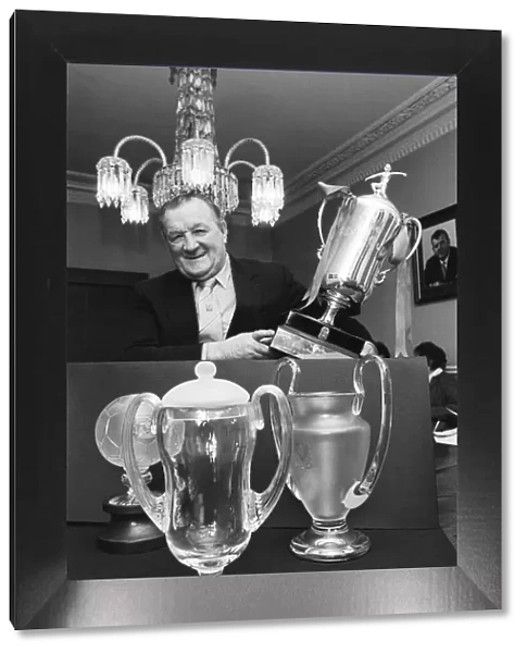 Former Liverpool manager Bob Paisley with a few replicas of the trophies which he won