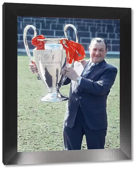 Liverpool manager Bob Paisley poses with the European Cup trophy at Anfield