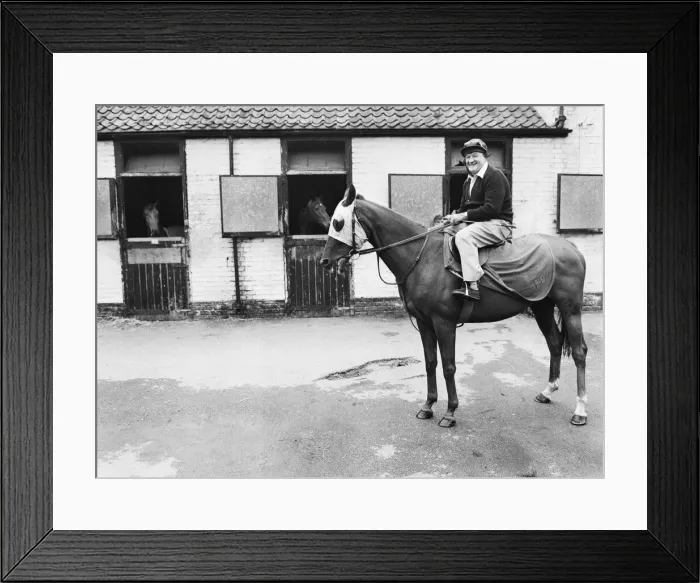 Framed Print : Liverpool manager Bob Paisley sitting astride Banner Street Framed Print : Liverpool manager Bob Paisley sitting astride Banner Street