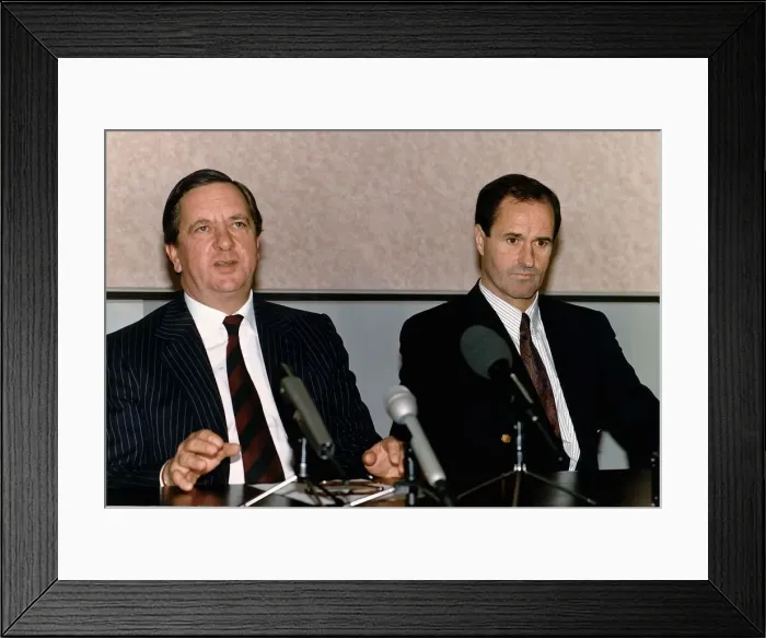 Framed Print : Football Chairman of Arsenal FC Peter Hill Wood sitting in a press conference alongside