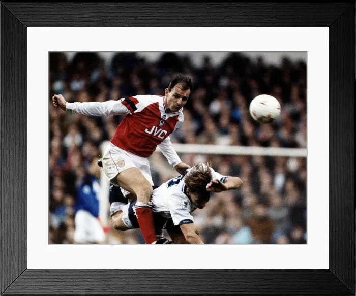 Framed Print : Football player Steve Bould for Arsenal against tackles Teddy Sheringham Framed Print : Football player Steve Bould for Arsenal against tackles Teddy Sheringham
