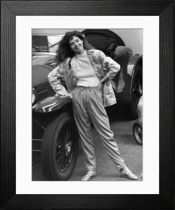 Framed Print : 1980s Fashion: Model wears apple green trousers with green white pattern jacket standing Framed Print : 1980s Fashion: Model wears apple green trousers with green white pattern jacket standing