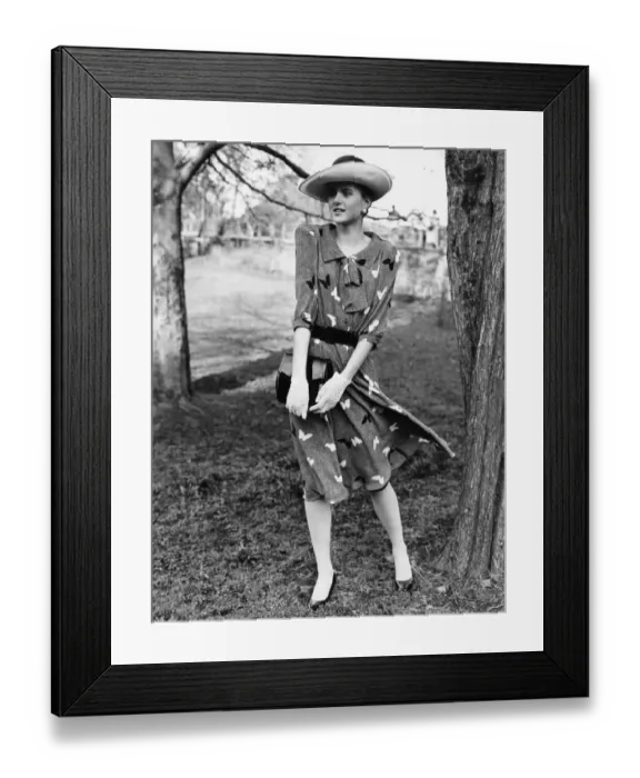 Framed Print : 1980s Womens Fashion: Our model wears a butterfly motif belted dress