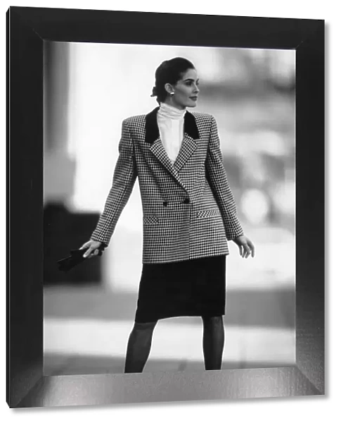 1980s Women,s Fashion: Our model wears Check double breasted jacket with black skirt