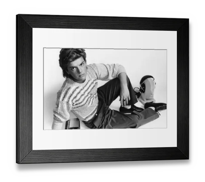 Framed Print : Mens Fashions Spring 1985. Our model wears stripe knitwear jumper pleated trousers tucked