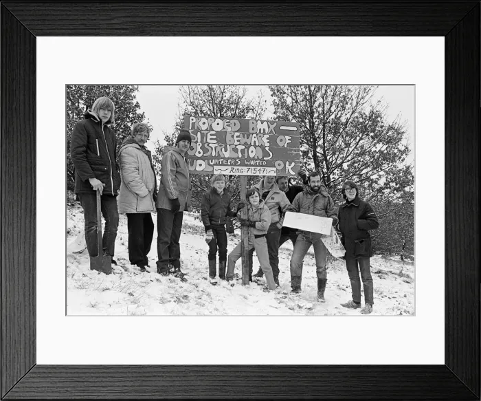 Framed Print : Young stunt cycling enthusiasts stake their claim to land which is being converted into a Framed Print : Young stunt cycling enthusiasts stake their claim to land which is being converted into a