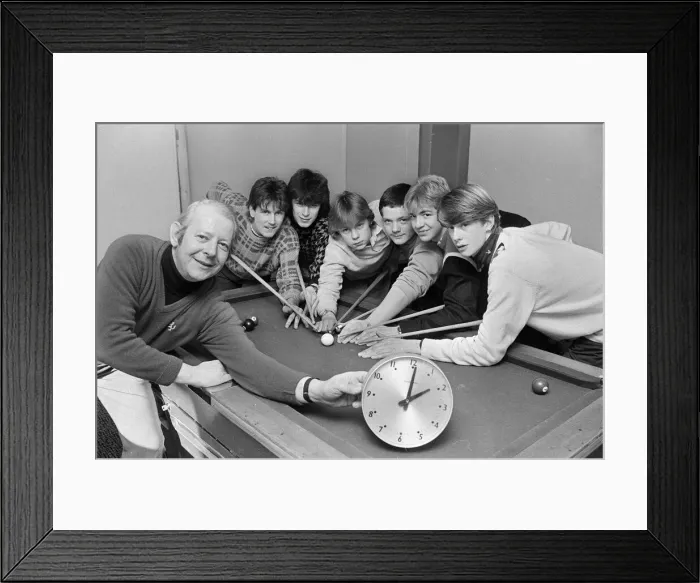 Framed Print : Shepley Youth Club leader Stewart Hughes kept an eye on the clock as club members took Framed Print : Shepley Youth Club leader Stewart Hughes kept an eye on the clock as club members took