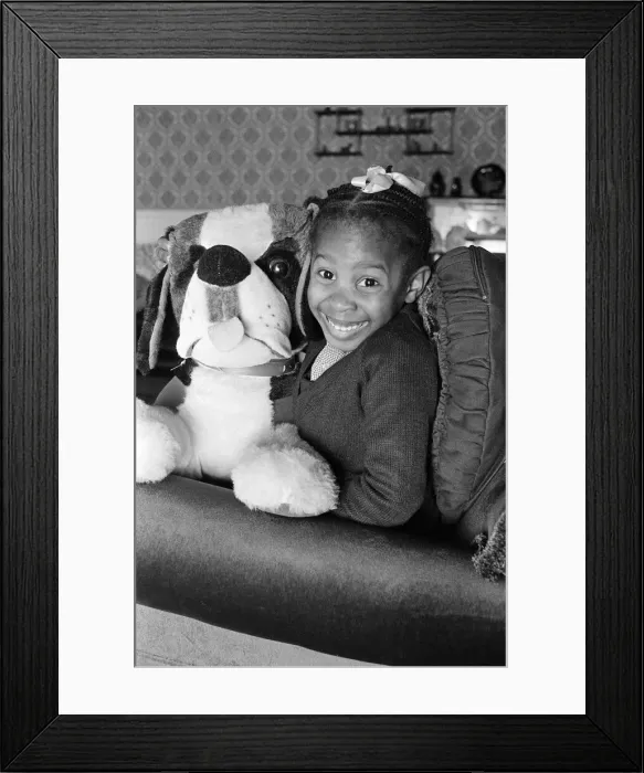 Framed Print : Tiny Tia Pinnock-Hamilton toddled five miles to help raise funds for famine relief in Framed Print : Tiny Tia Pinnock-Hamilton toddled five miles to help raise funds for famine relief in