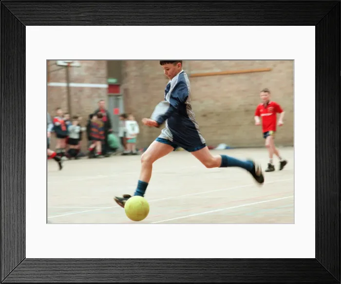 Framed Print : Children playing football in an annual 5-a-side football tournament held at Bishopsgarth