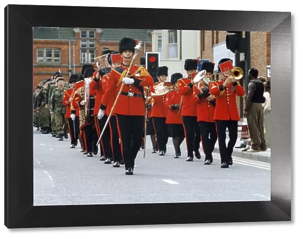 The band leads the way as the 34th Signal Regiment parades through the centre of
