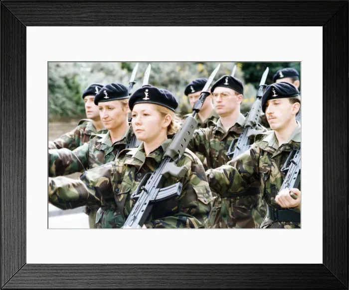 Framed Print : The band leads the way as the 34th Signal Regiment parades through the centre of Framed Print : The band leads the way as the 34th Signal Regiment parades through the centre of