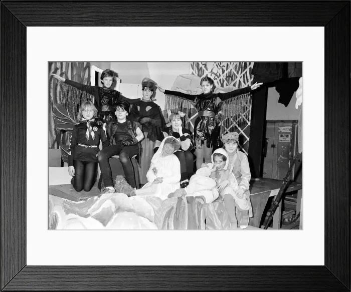 Framed Print : Audiences at the latest production by young Colne Valley High School pupils face a tall Framed Print : Audiences at the latest production by young Colne Valley High School pupils face a tall