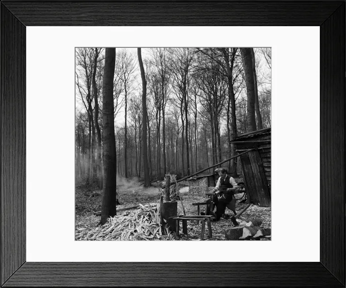 Framed Print : Owen Dean shaping Beechwood chair legs by his hut in the Buckinghamshire woods Framed Print : Owen Dean shaping Beechwood chair legs by his hut in the Buckinghamshire woods