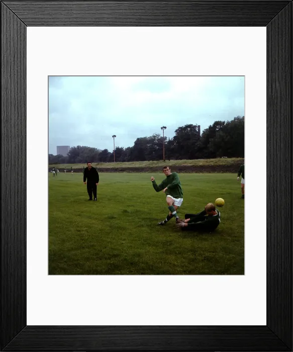 Framed Print : Bobby Lennox footballer Celtic FC during training shooting past goalkeeper Bent Martin Framed Print : Bobby Lennox footballer Celtic FC during training shooting past goalkeeper Bent Martin