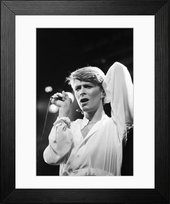 Framed Print : British pop singer David Bowie performing on stage during his concert at Earls court