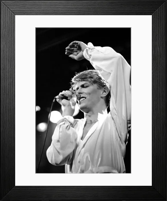 Framed Print : British pop singer David Bowie performing on stage during his concert at Earls court