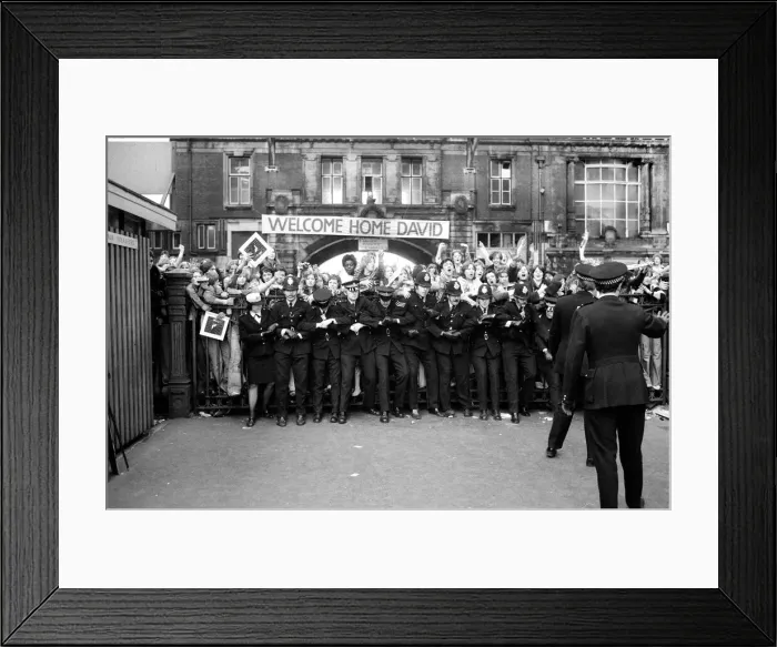 Framed Print : British pop singer David Bowie arrives home at Victoria Station