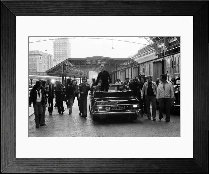 Framed Print : British pop singer David Bowie arrives home at Victoria Station