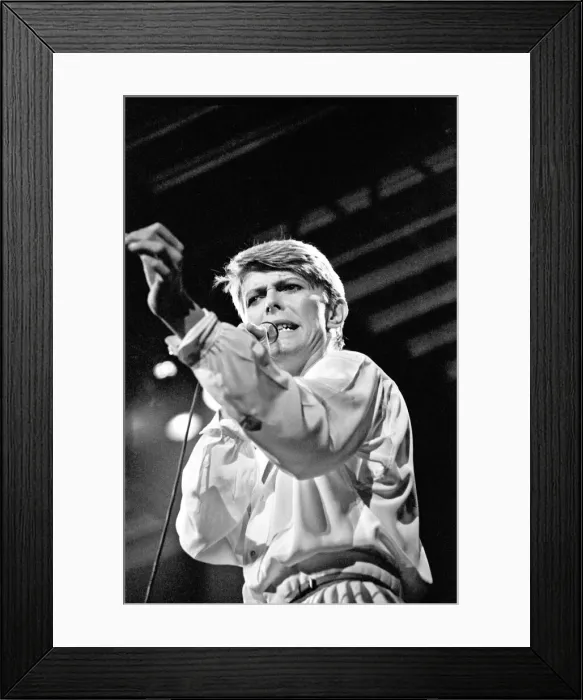 Framed Print : British pop singer David Bowie performing on stage during his concert at Earls court