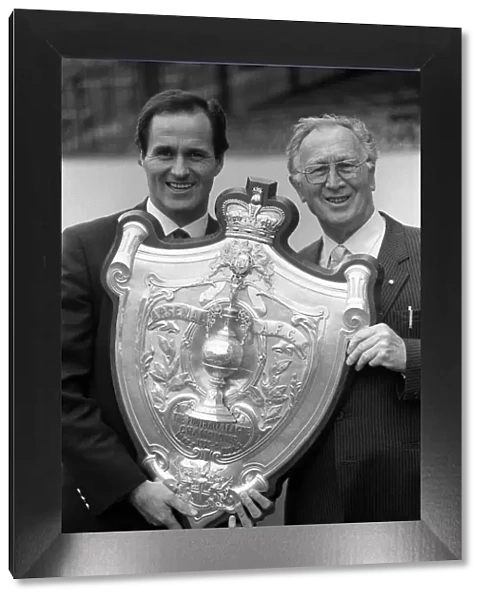 George Graham and Joe Mercer hold the Championship shield at Highbury