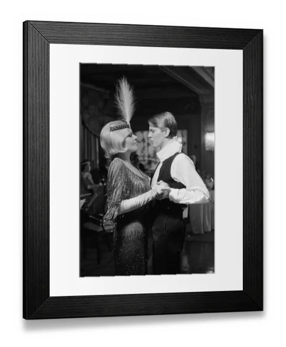 Framed Print : British pop singer David Bowie and actress Kim Novak pictured in a scene from their Framed Print : British pop singer David Bowie and actress Kim Novak pictured in a scene from their