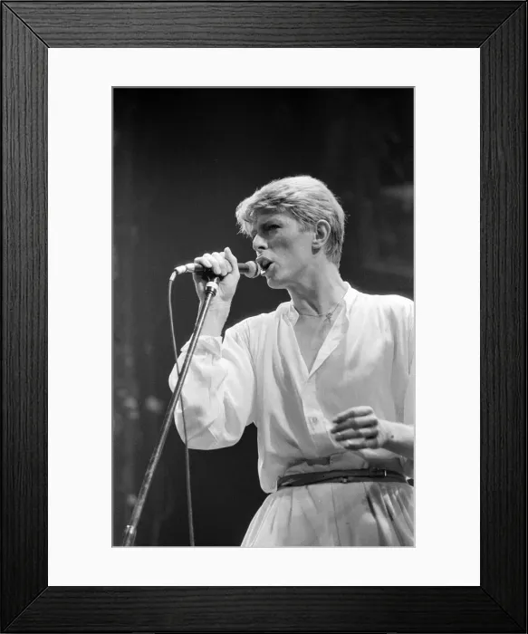 Framed Print : British pop singer David Bowie performing on stage during his concert at Earls court