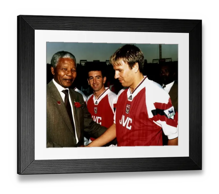 Framed Print : Paul Merson, football player for Arsenal FC, shakes hands with the President of South
