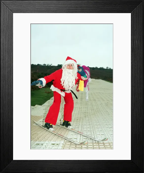 Framed Print : Santa, alias Steve Prince, senior instructor at the Eston Ski Village gets into the mood Framed Print : Santa, alias Steve Prince, senior instructor at the Eston Ski Village gets into the mood