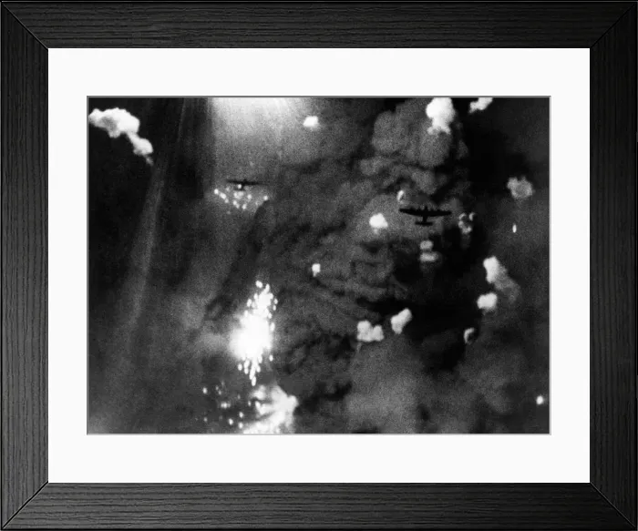 Framed Print : Two of RAF Bomber Commands heavy Lancaster bombers silhouetted against dense clouds Framed Print : Two of RAF Bomber Commands heavy Lancaster bombers silhouetted against dense clouds