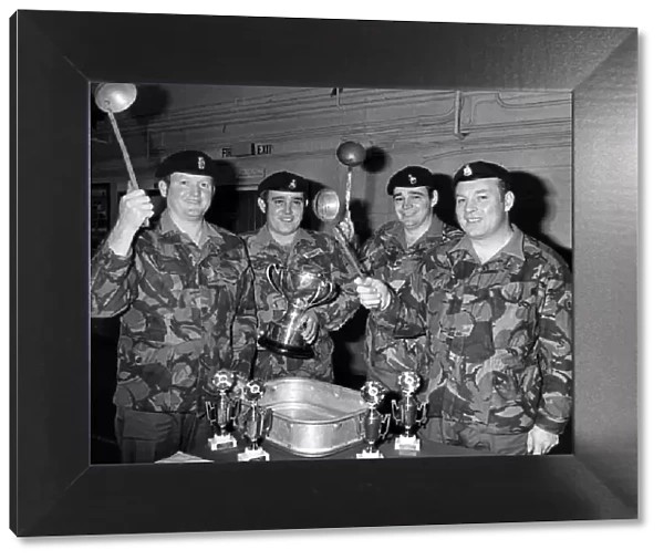 A team of three cooks and a driver from the 82 Ordnance company (V