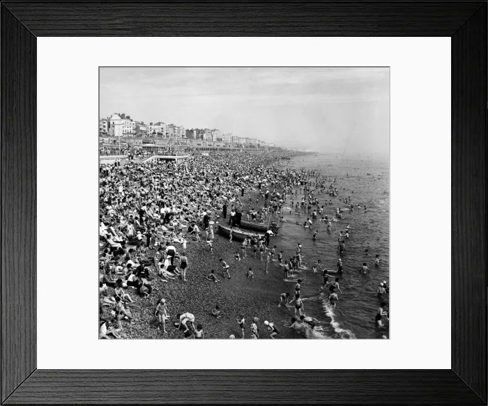 Framed Print : People enjoying the hot weather in Brighton, East Sussex. July 1957