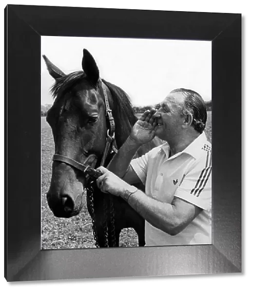 Liverpool manager Bob Paisley pictured at the stables of his close friend Frank Carr in