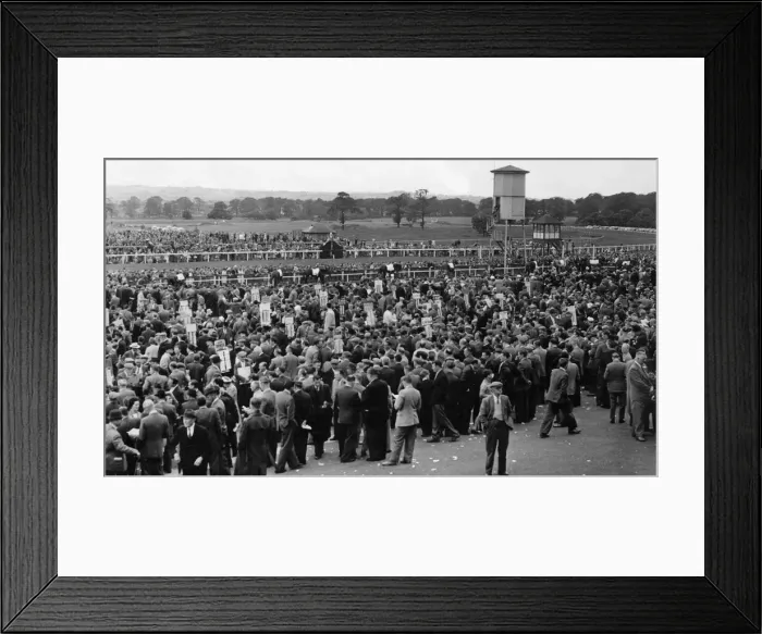 Framed Print : Bookies stands showing like little banners amongst the crowd at Newcastle