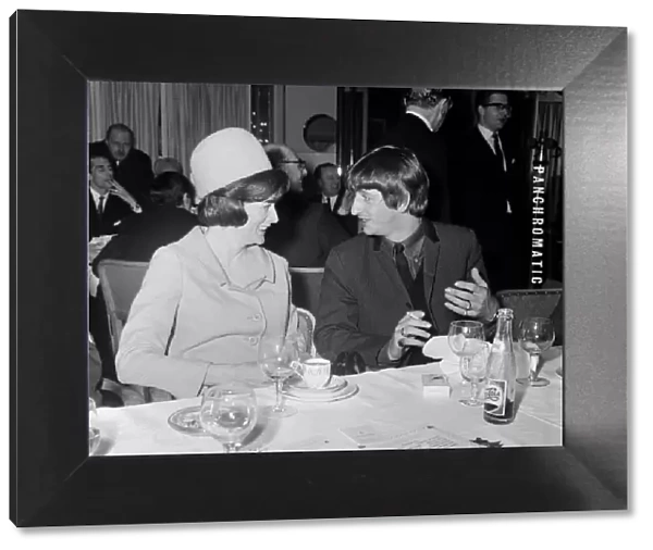 Ringo Starr chats with smiling stage star Maggie Smith during the Variety Club Luncheon