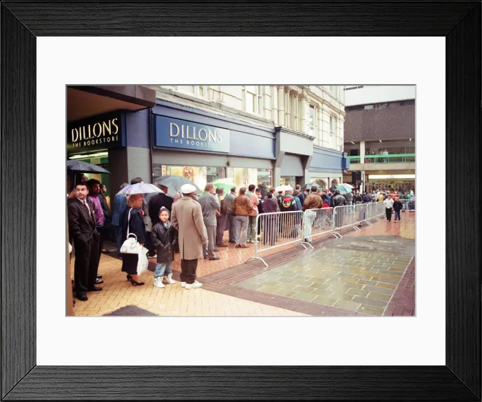 Framed Print : Boxing fans queue outside Dillions book store in Birmingham to see Muhammad Ali Framed Print : Boxing fans queue outside Dillions book store in Birmingham to see Muhammad Ali