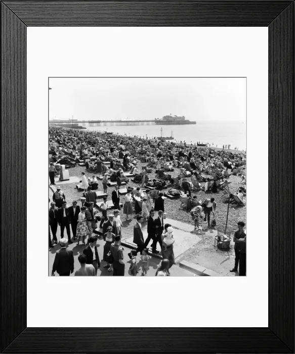 Framed Print : Crowded scenes on Brighton Beach as holidaymakers enjoy the hot summer weather Framed Print : Crowded scenes on Brighton Beach as holidaymakers enjoy the hot summer weather