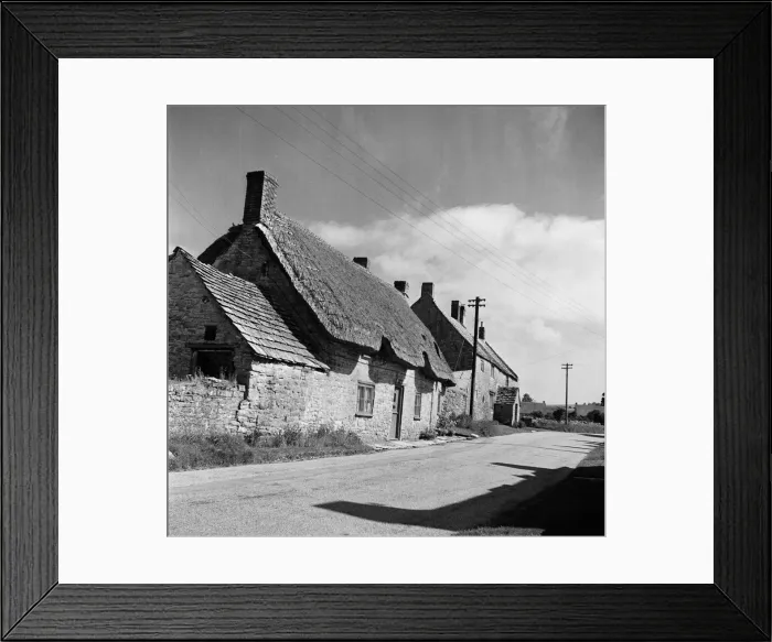 Framed Print : Corfe Castle village, Dorset. Circa 1952 Framed Print : Corfe Castle village, Dorset. Circa 1952