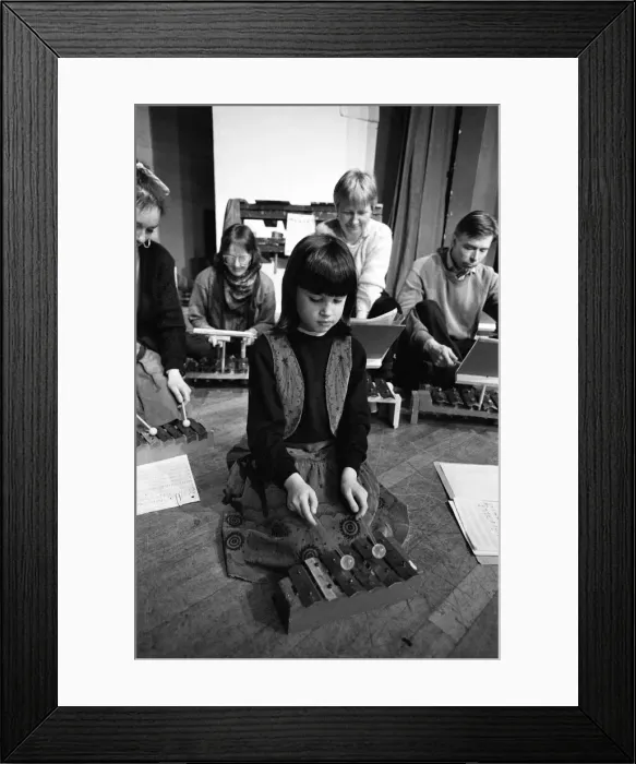 Framed Print : Hitting the right note... seven year old Polly Scott and her percussion group starred